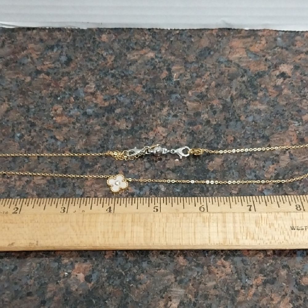 Clover Pendant On Gold Chain.
